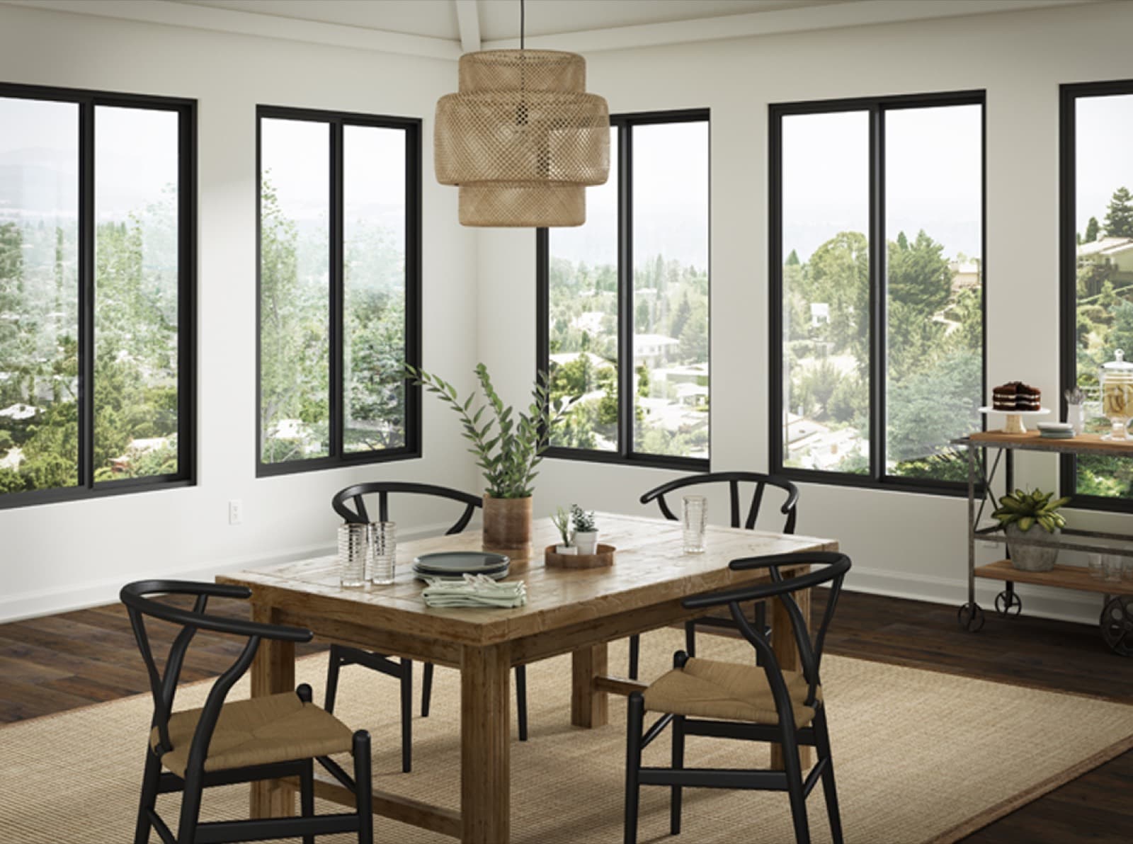 Dining room with black Milgard Trinsic windows on two walls